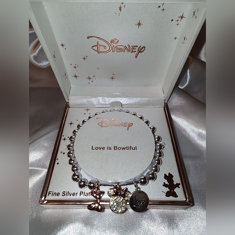 Pretty Disney Stretch Charm Bracelet New In Box With Tags.
